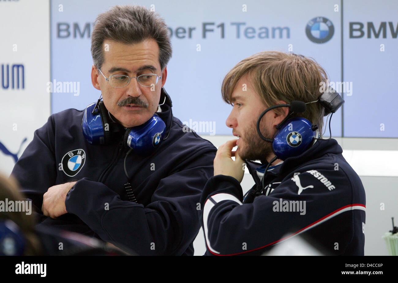 German Formula One driver Nick Heidfeld of BMW Sauber (R) and BMW Motorsport Director, German Mario Theissen, talk before the new 'F1.08' is out for a test drive on the circuit of Valencia, Spain, 15 January 2008. The new F1 car was presented the previous day in Munich, Germany. Photo: GERO BRELOER Stock Photo