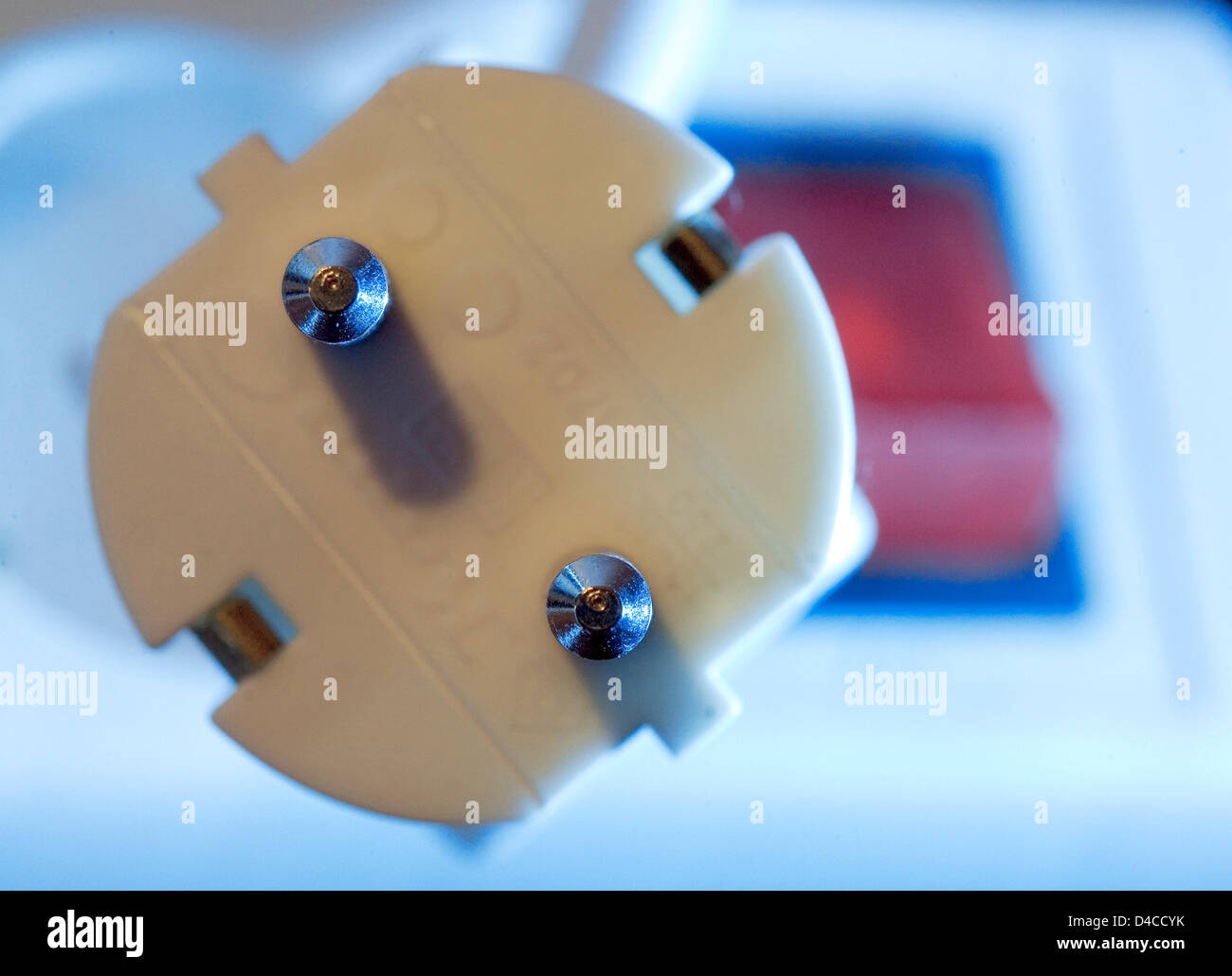 A plug and a power socket switch at close up in Osnabrueck, Germany, 14 January 2008. Illustration on the topic: Energy, electricity, additional housing costs. Photo: Friso Gentsch Stock Photo