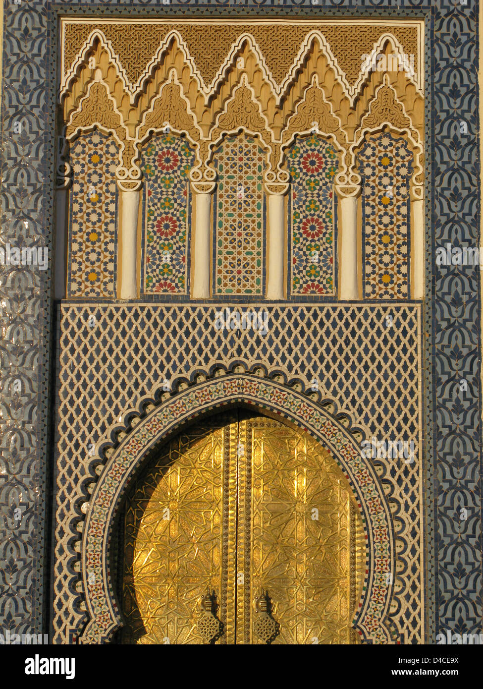 The photo depicts an entrance gate to the Royal Palace in Fes, Morocco ...