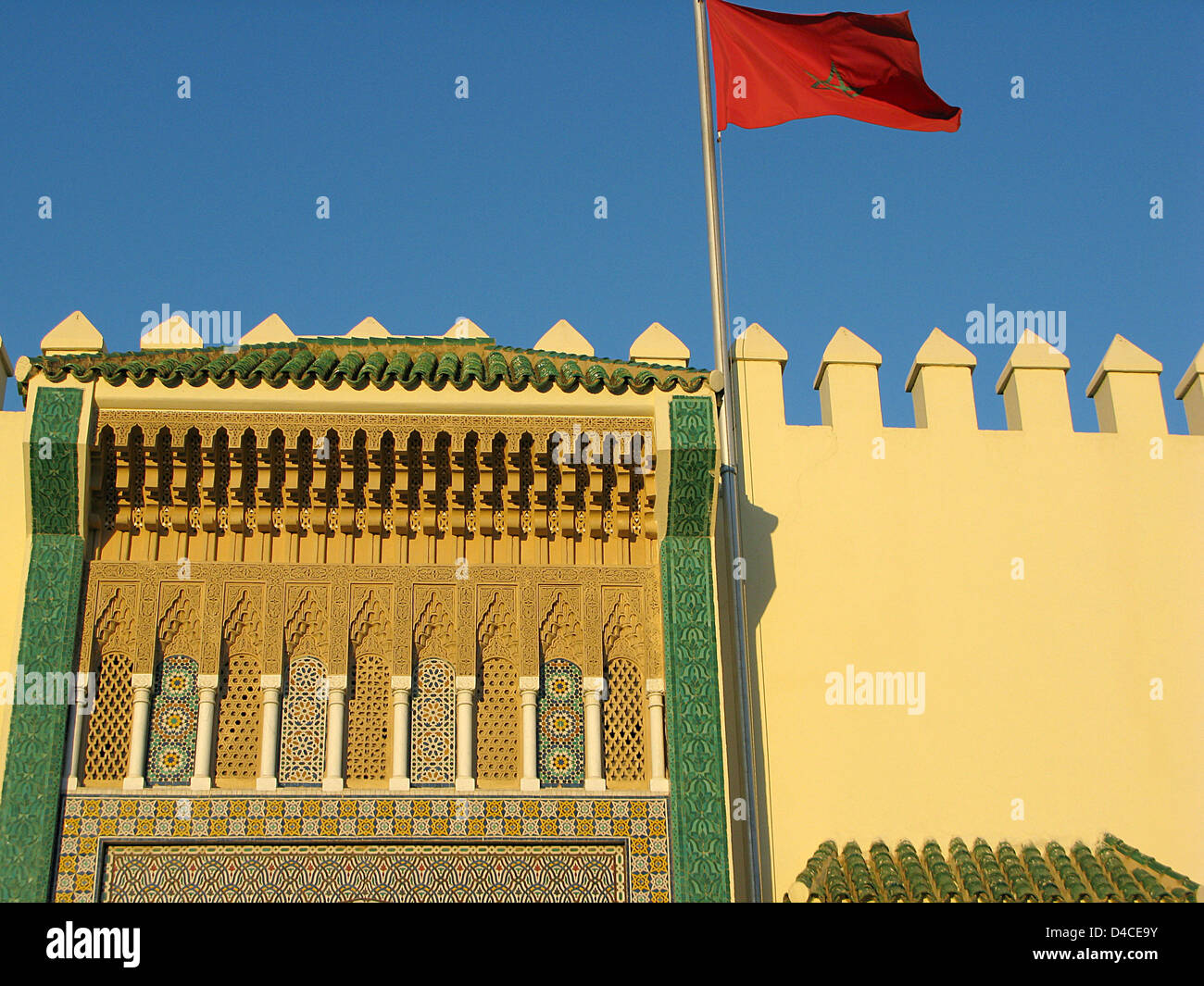 The Moroccan flage flies above an entrance gate to the Royal Palace in Fes, Morocco, 15 December 2007. Photo: Lars Halbauer Stock Photo