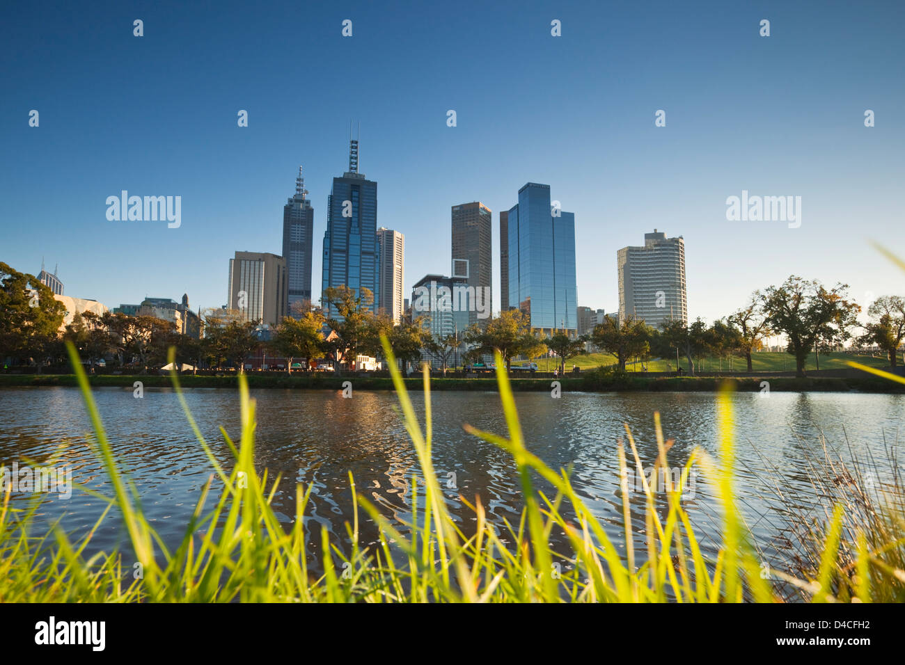 View across Yarra River to city skyline at dawn. Melbourne, Victoria, Australia Stock Photo