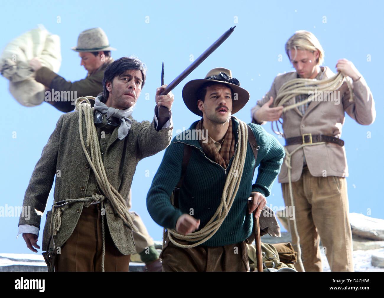 A handout photo made available by GES-Sportfoto depicts the head coach of Germany's national soccer team, Joachim Loew (front L), goalkeeper Timo Hildebrand (R) and player Piotr Trochowski (L) performing in historical mountain climbing clothes during the shooting of an Mercedes Benz commercial in Gross-Gerau, Germany, 04 February 2008. Photo: MARKUS GILLIAR Stock Photo