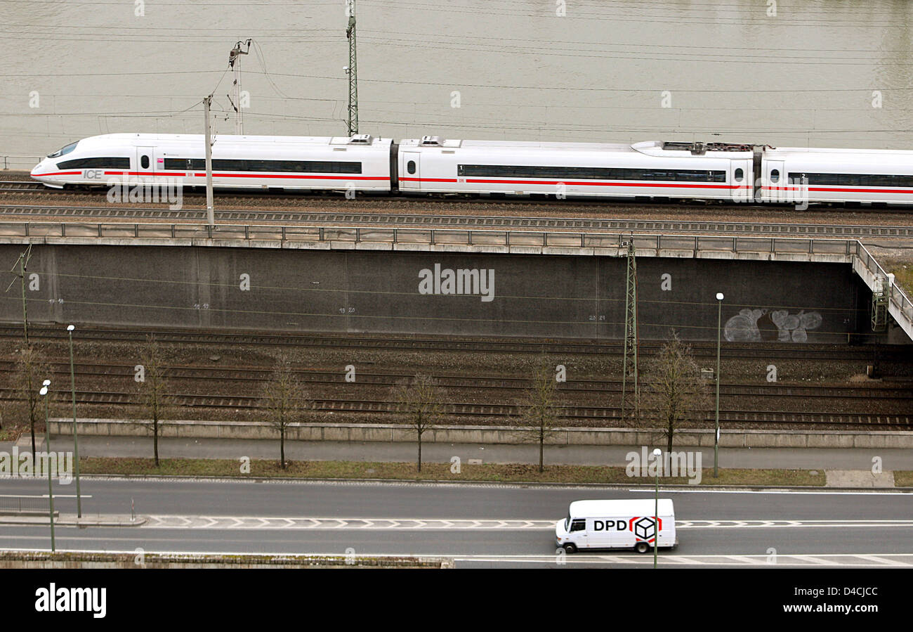 An ICE highspeed train (top) and parcel service vehicle (botom) are two means of transport pictured in Wuerzburg, Germany, 04 February 2008. Photo: Karl-Josef Hildenbrand Stock Photo