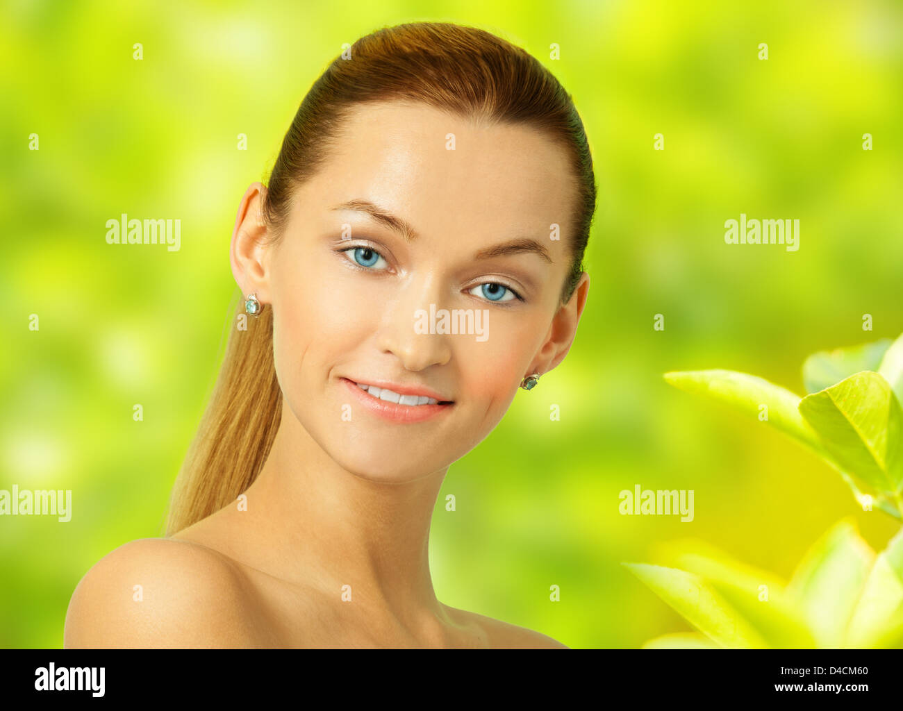 Happy smiling Caucasian young girl with long hair and blue eyes with ...