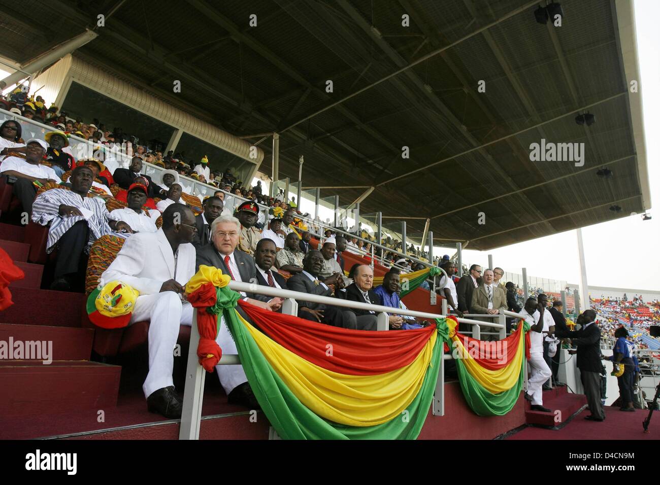 (front row) German Foreign Minister Frank-Walter Steinmeier (2-L), FIFA President Joseph Blatter (5-L), and Ghanaian President John Kufour (4-L), watch the Africa Cup of Nations Final Cameroon v Egypt in Accra, Ghana, 10 February 2008.  Steinmeier is on a three-day visit to Ghana, Togo and Burkina Faso. Photo: TIM BRAKEMEIER Stock Photo