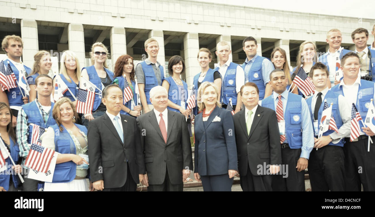 Republic of Korea Defense Minister Kim Tae-Young, Secretary Gates, Secretary Clinton, and Republic of Korea Foreign Minister Yu Myung-hwan Pose for a Photo With Children of Korean War Veterans Stock Photo