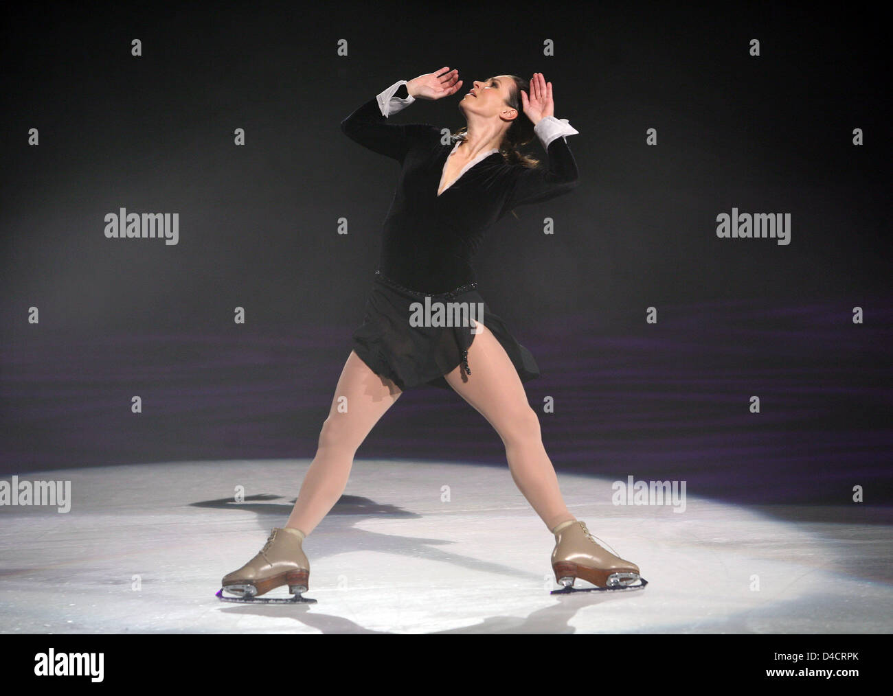 German figure skater Katarina Witt performs a free skate on her farewell tour stopping over in Berlin, Germany, 16 February 2008. The 42-year-old, who remains one of the most successful figure skaters of all time, will give a retrospect on her decades-long career including numerous World and Olympic title, most of them claimed in the 1980s. Photo: STEPHANIE PILICK Stock Photo
