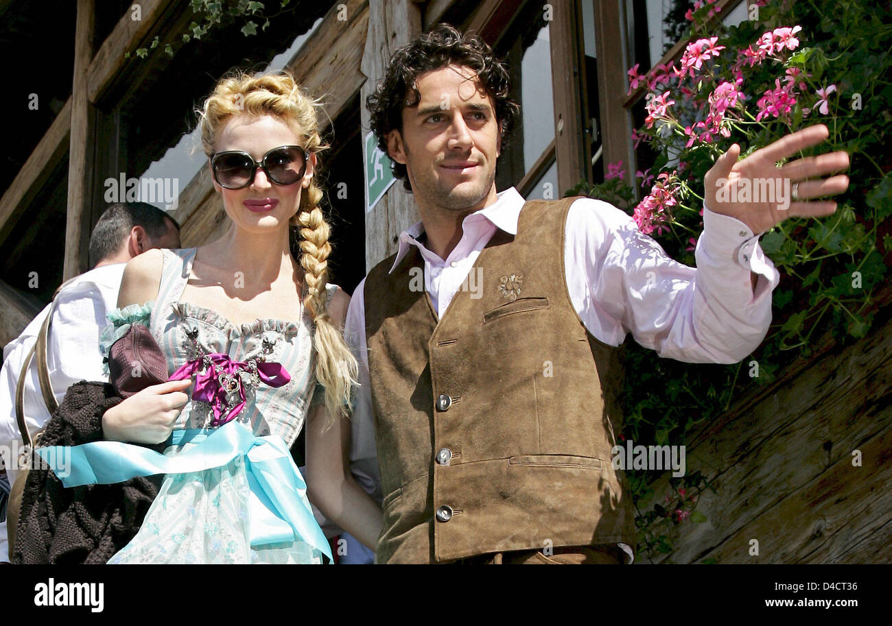 Bayern Munich's Italian striker Luca Toni and his finacee Marta Cecchetto depicted during a visit to the 'Oktoberfest' in Munich, Germany, 30 September 2007. According to Munich newspapers burglers emptied Toni's new villa on Saturday, 16 February 2008. They stole valuable jewellery from Toni's fiancée Marta and various cups, but luckily forgot or overlooked Toni's World Cup 2006 m Stock Photo