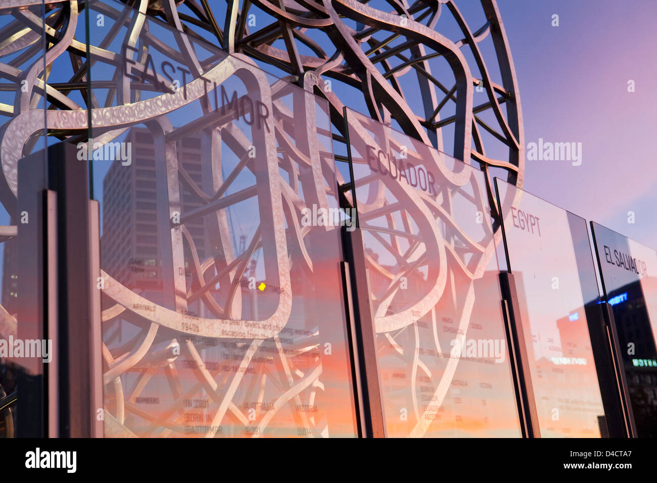 Glass panels telling the story of migration to Australia on the Sandridge Bridge. Melbourne