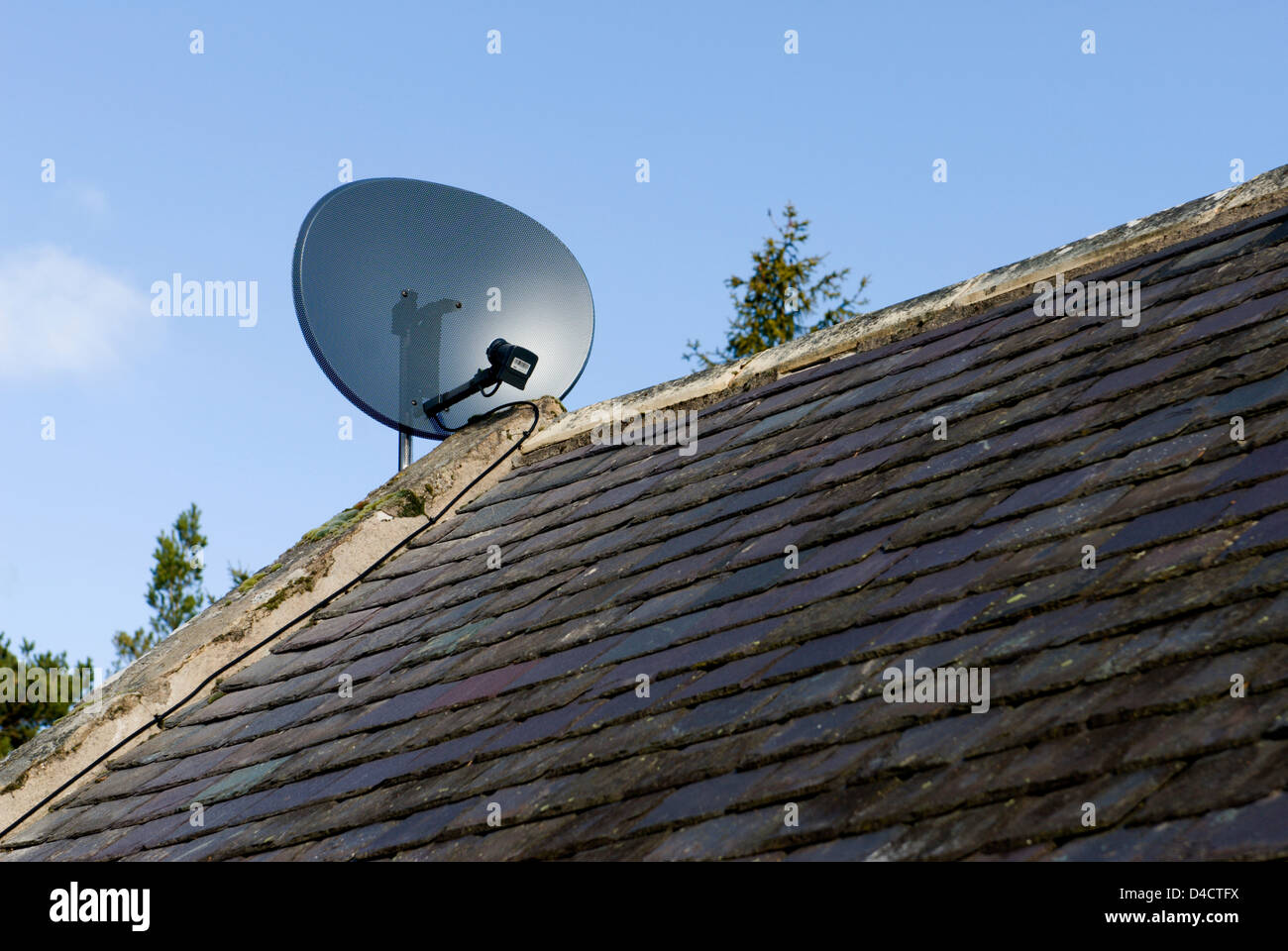 Satellite aerial dish on a remote house in rural Aberdeenshire Stock Photo Alamy
