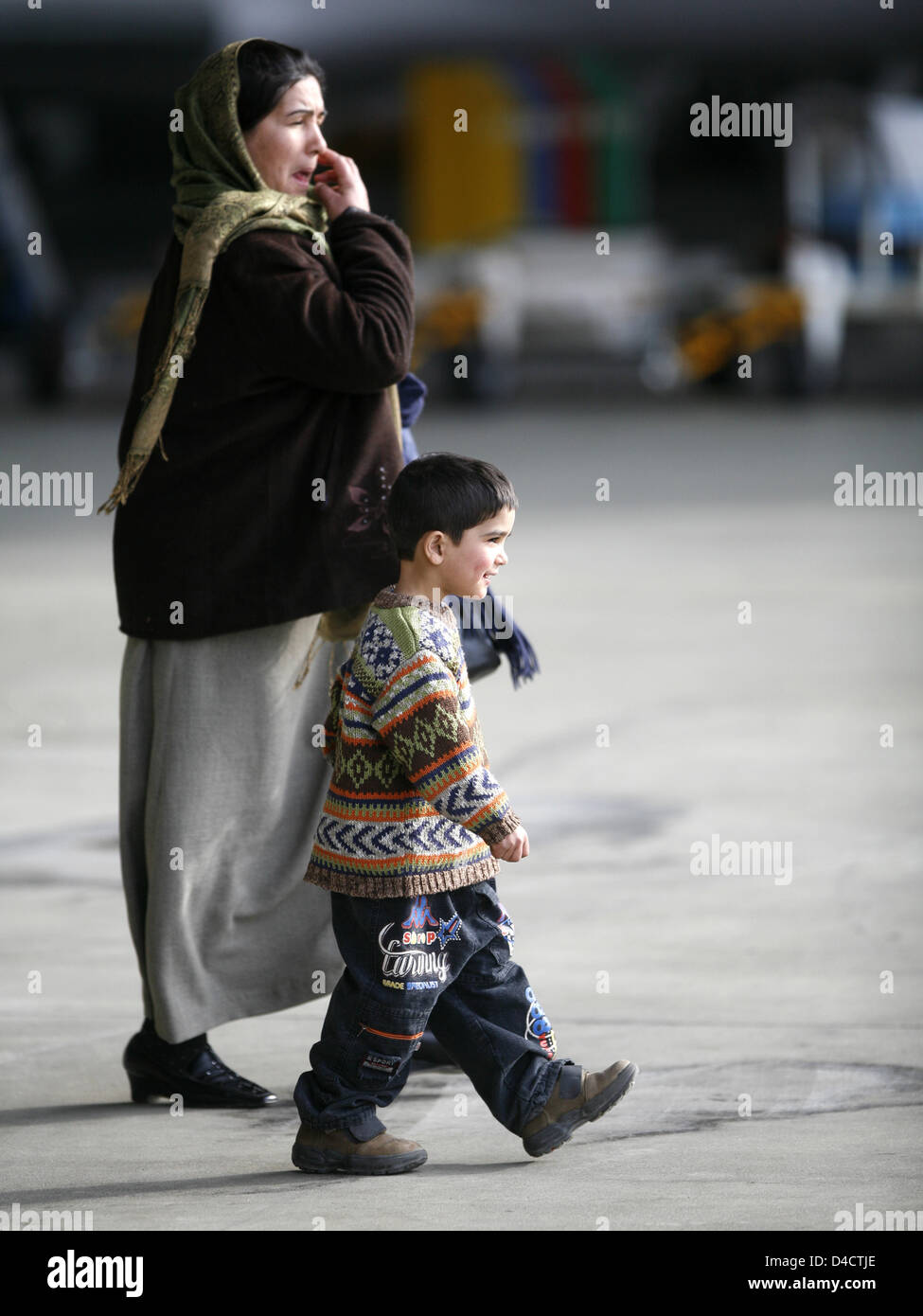 Woman in blue white and red hijab photo – Free Man alone Image on