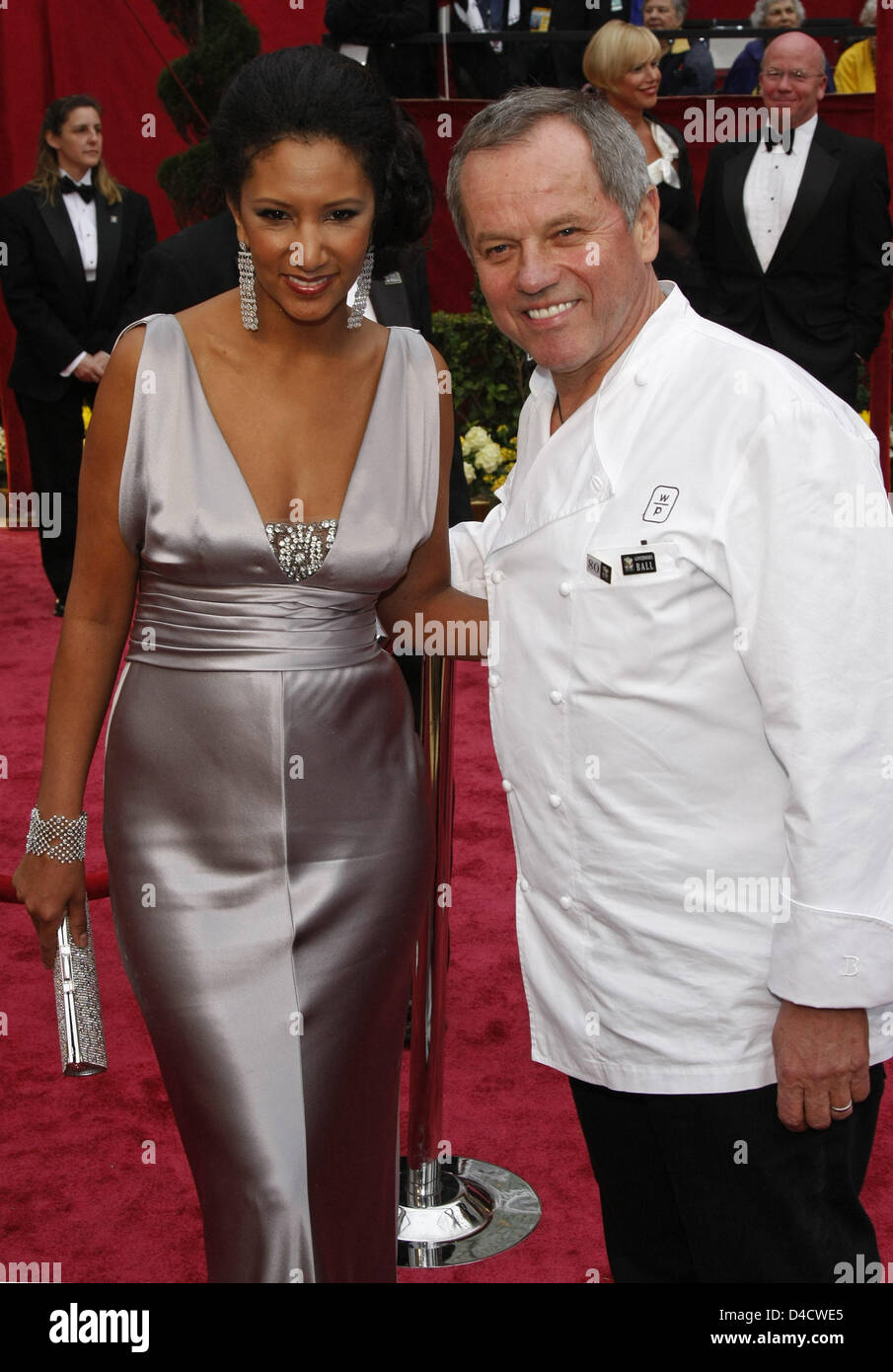 Austrian chef Wolfgang Puck (R) and his wife Gelila Assefa (L) arrive
