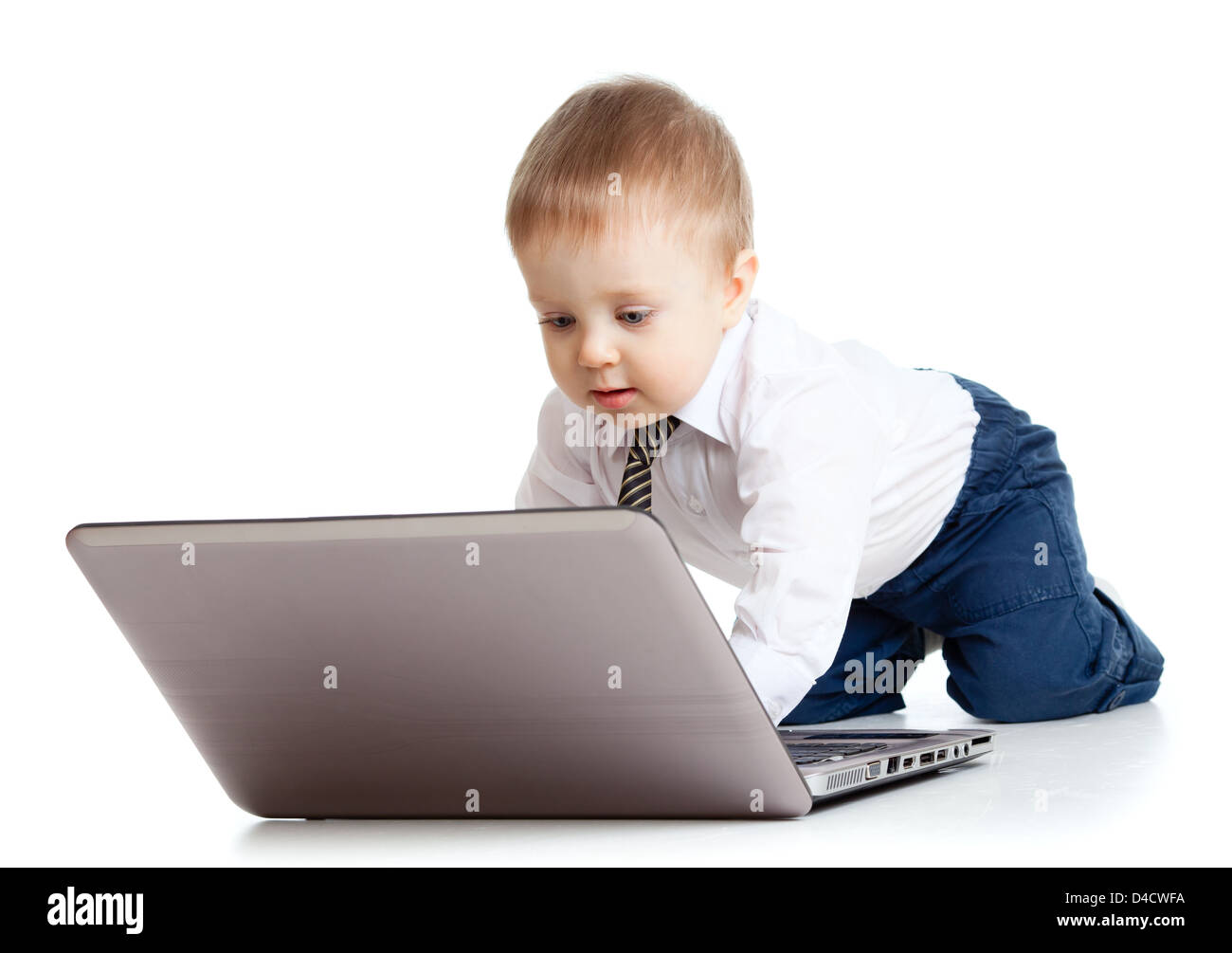 Child using a laptop Stock Photo