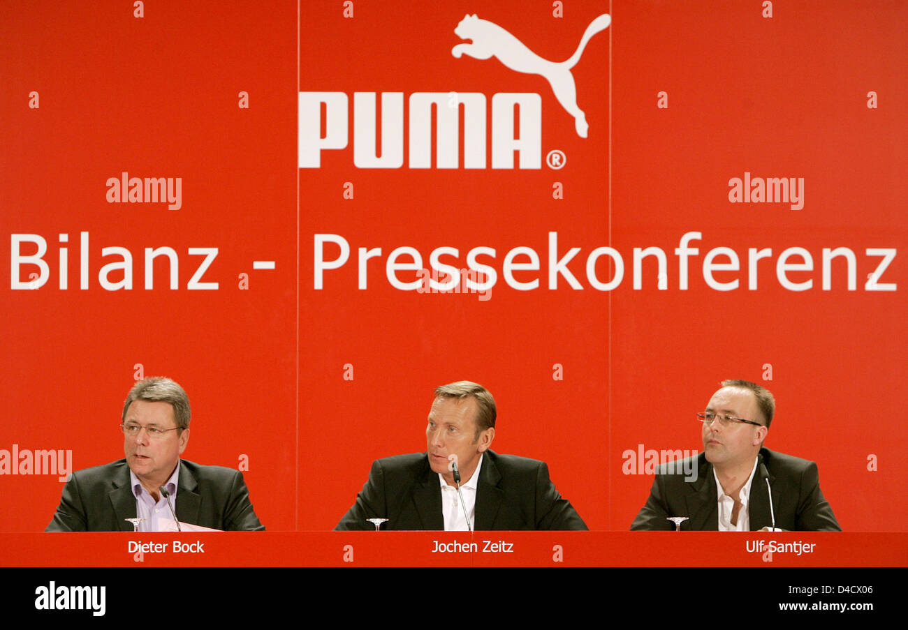 Puma CEO Jochen Zeitz (C), CFO Dieter Bock (L) and company spokesperson Ulf Santjer (R) pictured during the company's balance press conference in Nuremberg, Germany, 26 February 2008. The sports goods producer expects a growth in sales in the one-digit percentage and an increasing operating profit. Photo: DANIEL KARMANN Stock Photo