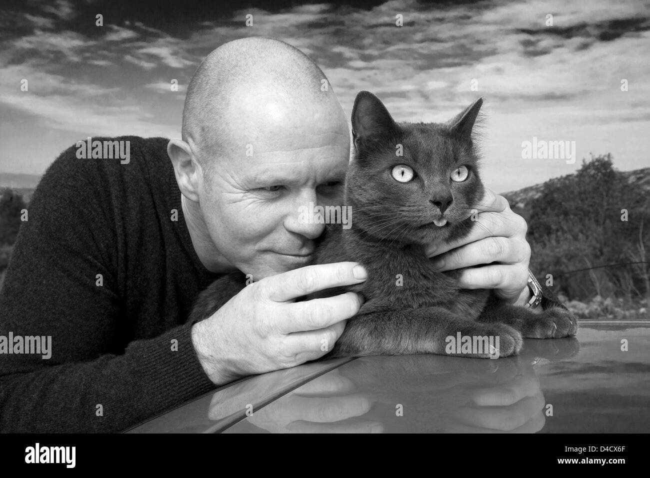 Man and cat Stock Photo
