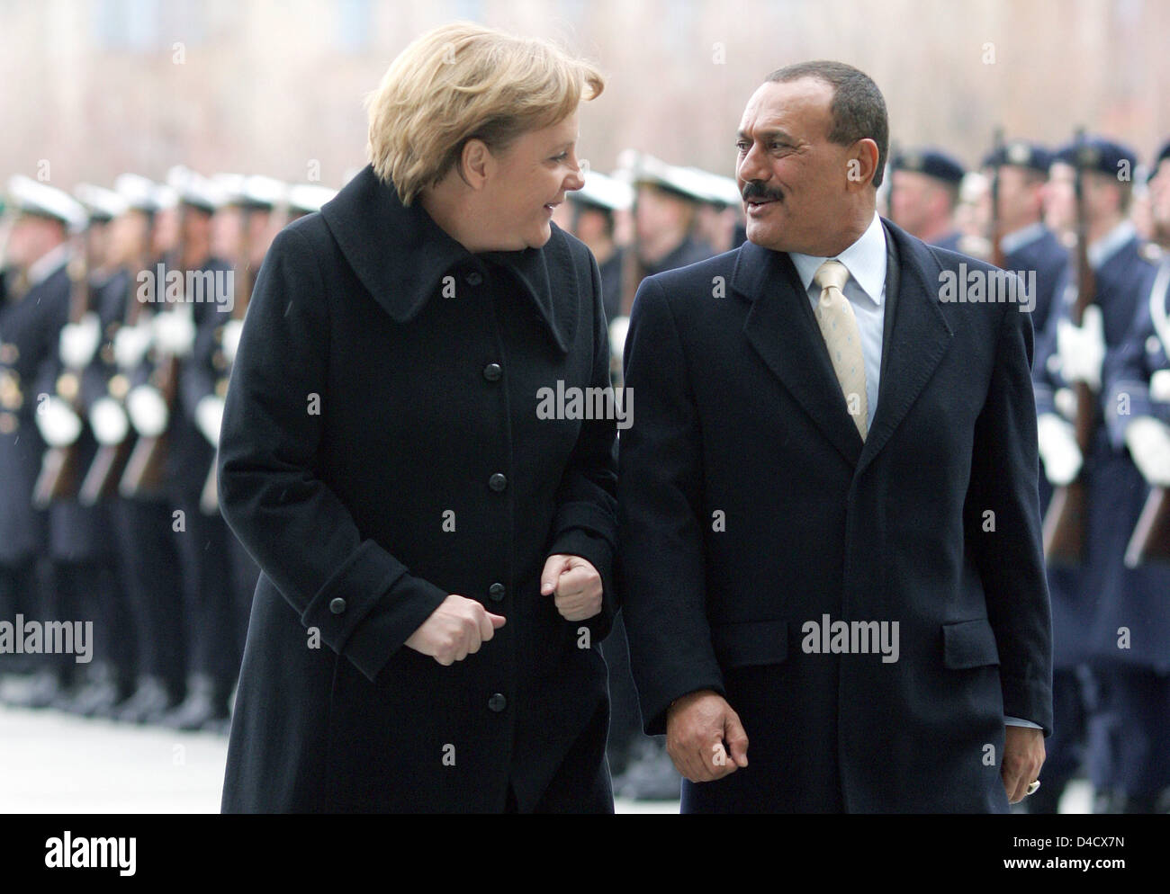German Chancellor Angela Merkel (L) and Yemeni President Ali Abdallah Saleh walk the guard of honour in Berlin, Germany, 27 February 2008. Photo: Gero Breloer Stock Photo