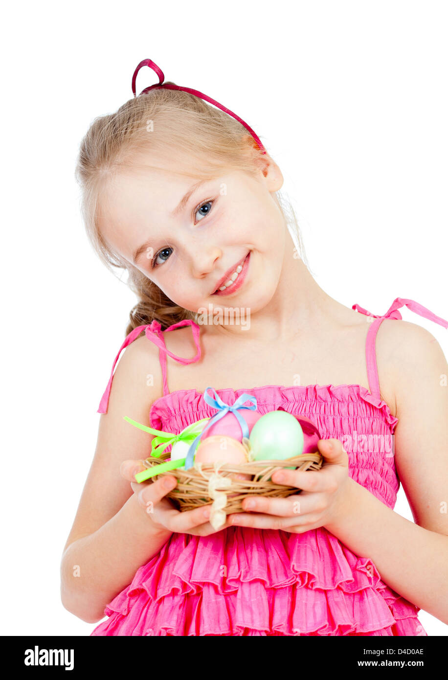 cute smiling little girl holding Easter eggs in basket Stock Photo Alamy