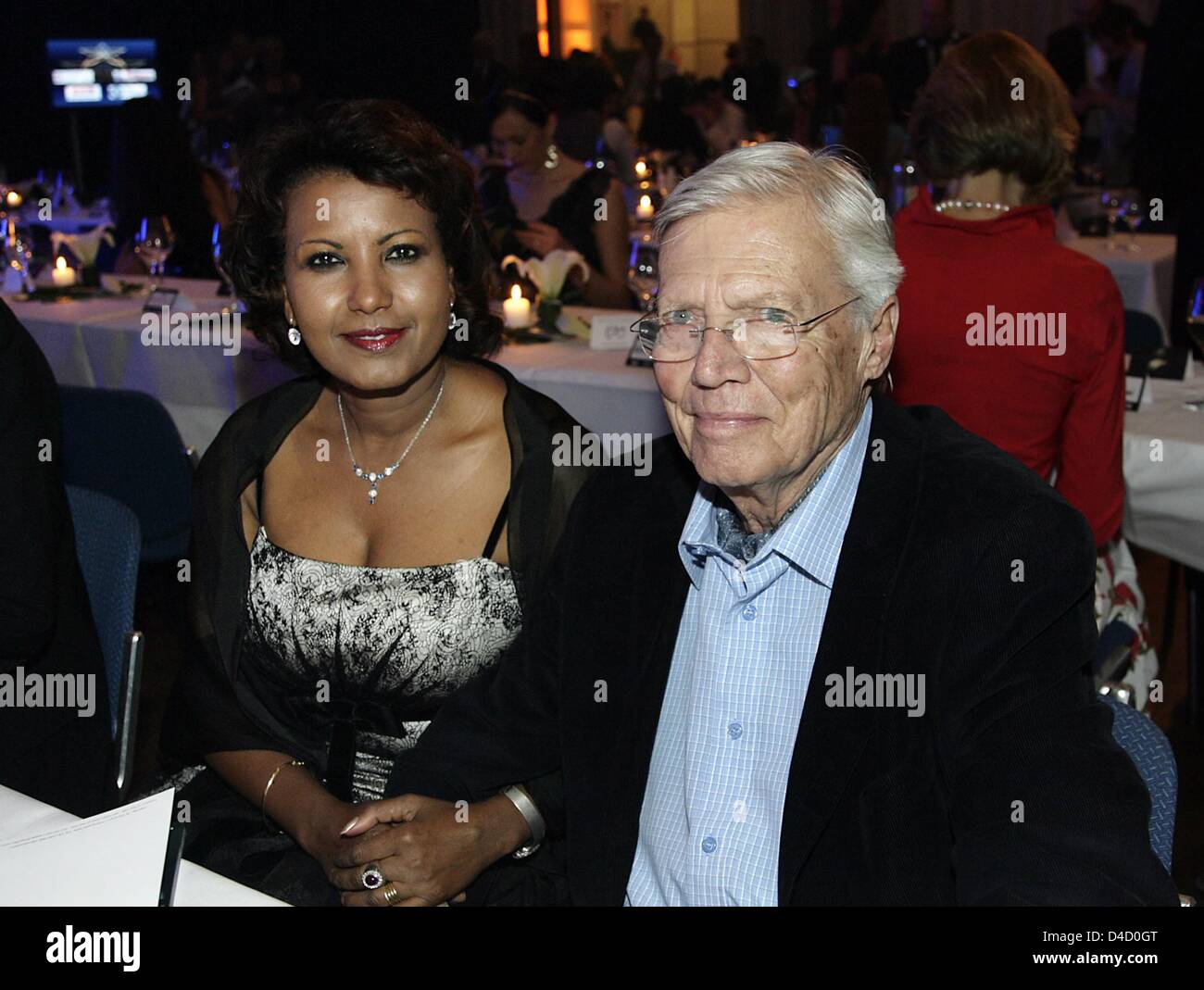 Actor Karlheinz Boehm (R), the founder and chair of the aid organisation 'Menschen fuer Menschen', and his wife Almaz are pictured at the Radio Regenbogen Awards in Karlsruhe, Germany, 08 March 2008. The Radio Regenbogen Award, also known under its official title as 'Media Award of Baden Wuerttemberg', is not endowed and has been awarded annually since 1998. Photo: Marijan Murat Stock Photo