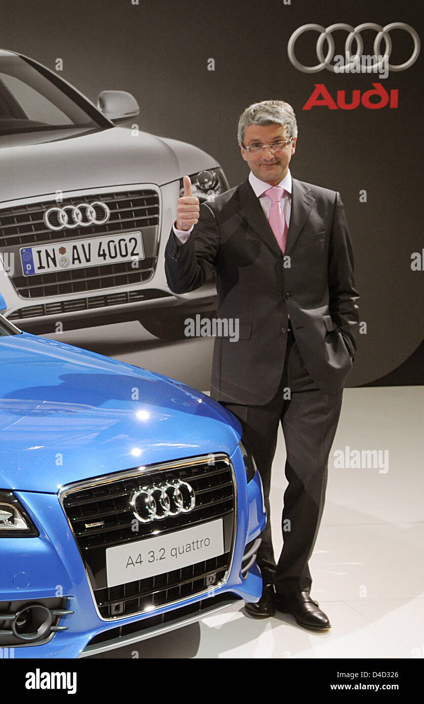 Audi CEO Rupert Stadler thumbs up next to a Audi A4 Avant before the annual press conference in Ingolstadt, Germany, 11 March 2008. Volkswagen subsidiary Audi has again achieved top results in turnover and profits in 2007 and aims to top those again in 2008. Pre-tax earnings rocketed by almost 50 per cent to 2.9 billion euro. Photo: ARMIN WEIGEL Stock Photo