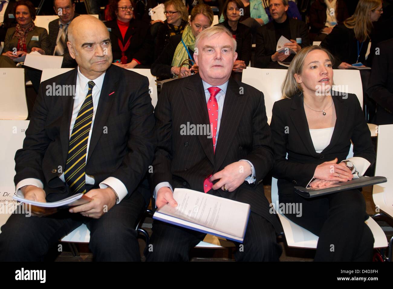 German  Minister of Family Affairs, Senior Citizens, Women and Youth Kristina Schroeder sits next to Otto Kenzler, President  of the Association of German  Craft (ZDH, L) and Hans Heinrich Driftmann, President of the German Chamber of Commerce (DIHK) during the 2013 Family Summit in Berlin, Germany, 12 March 2013. The summit focused on the topic flexible working hours for employees with family. Photo: MARC TIRL Stock Photo
