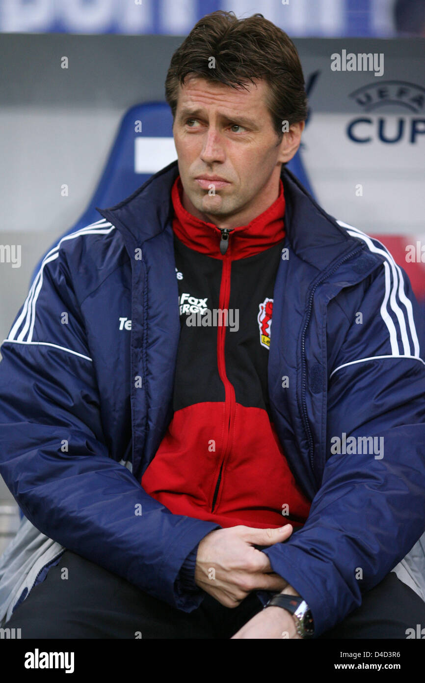 Leverkusen head coach Michael Skibbe follows the UEFA Cup round of 16's