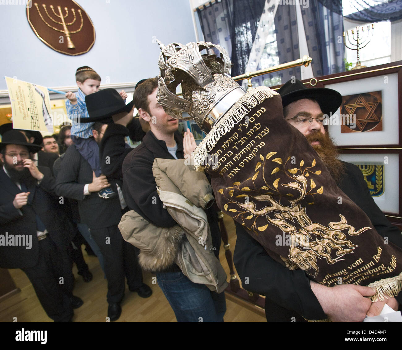 The jewish community of Frankfurt Oder receives its first Torah scrolls since WWII, in Frankfurt Oder, 16 March 2008. The scrolls are a present of Berlin education centre Chabad Lubawitsch. The comunnitie of about 600 receives the scolls on the occasion of a visit of 30 jewish Americans that took part ceremonial handing over of the scrolls. Photo: PATRICK PLEUL Stock Photo