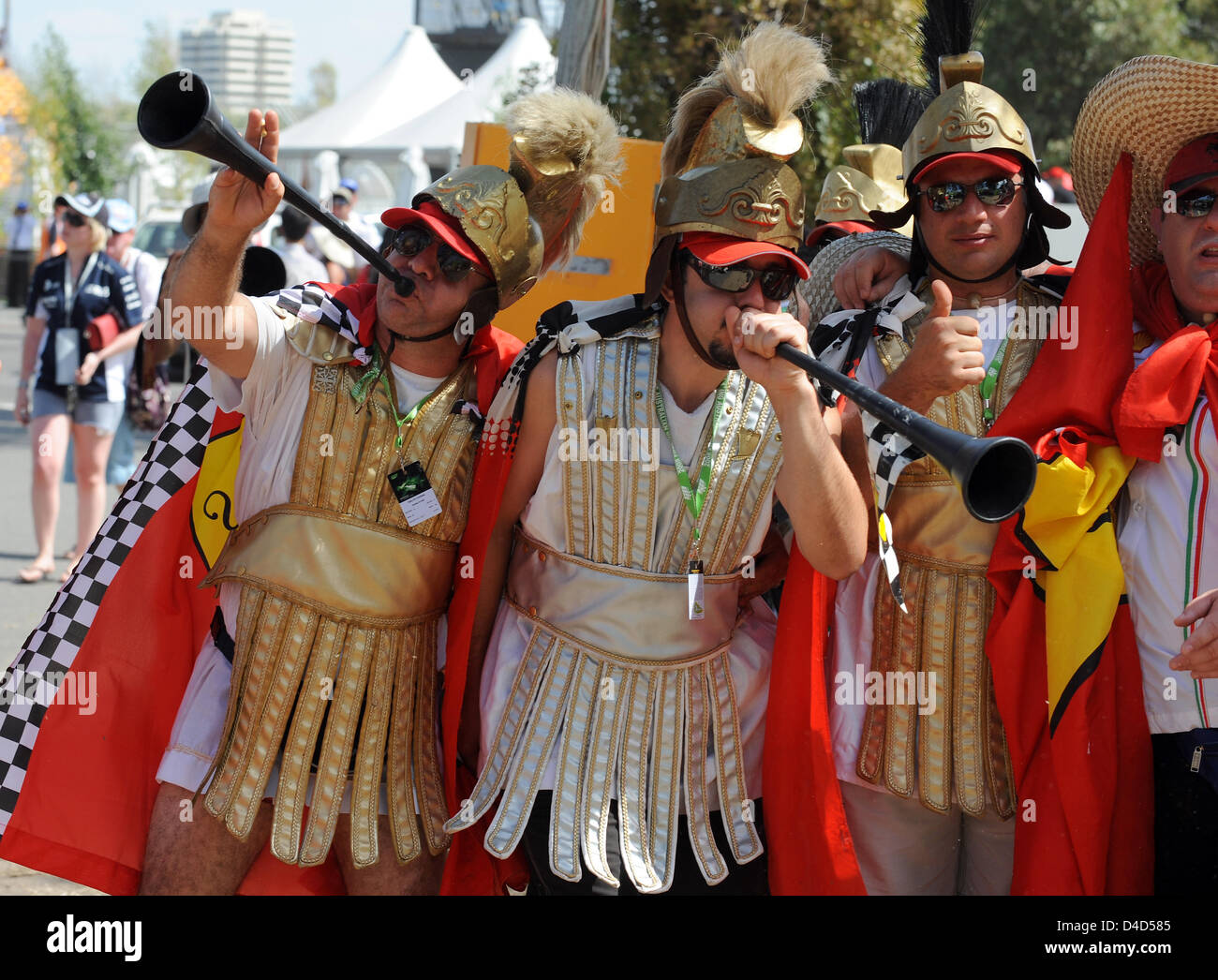 A group of Ferrari fans costumed as Romans on their way to Albert Park circuit in Melbourne, Australia, 16 March 2008. Hamilton homed a pole-to-flag victory in an action-packed and crash-strewn Australian GP. Photo: Gero Breloer Stock Photo