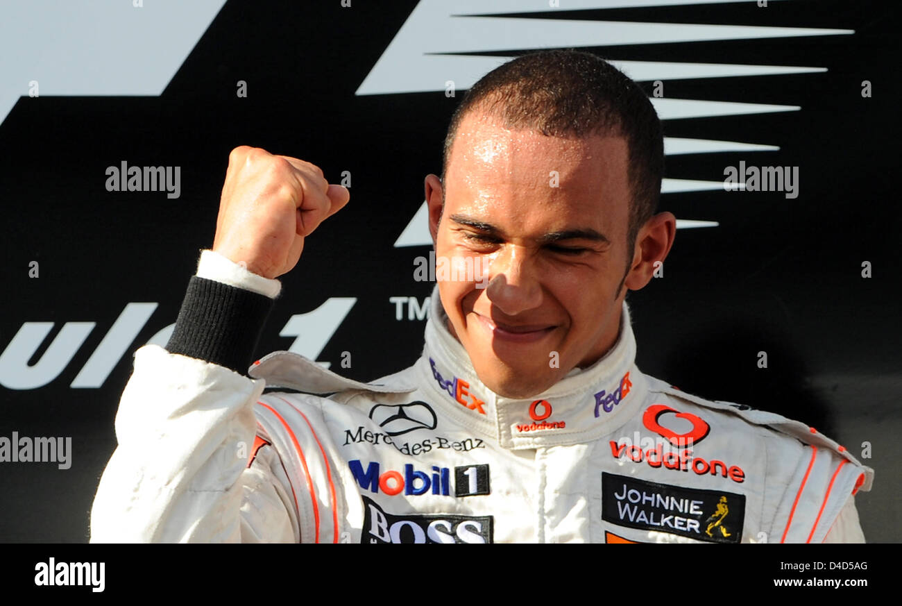 British Formula One driver Lewis Hamilton of McLaren-Mercedes cheers winning the Formula 1 Australian Grand Prix at Albert Park circuit in Melbourne, Australia, 16 March 2008. Hamilton homed a pole-to-flag victory in an action-packed and crash-strewn Australian GP. Photo: Gero Breloer Stock Photo