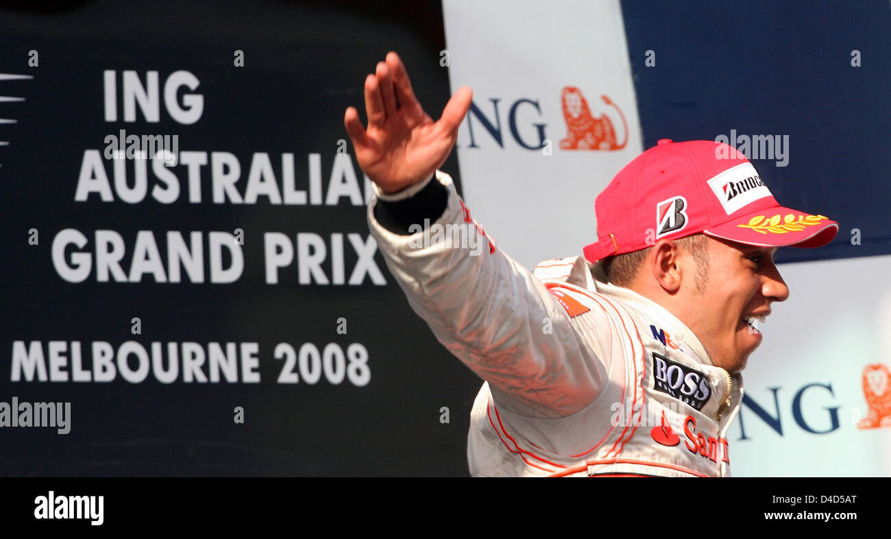 British Formula One driver Lewis Hamilton of McLaren-Mercedes cheers winning the Formula 1 Australian Grand Prix at Albert Park circuit in Melbourne, Australia, 16 March 2008. Hamilton homed a pole-to-flag victory in an action-packed and crash-strewn Australian GP. Photo: Roland Weihrauch Stock Photo