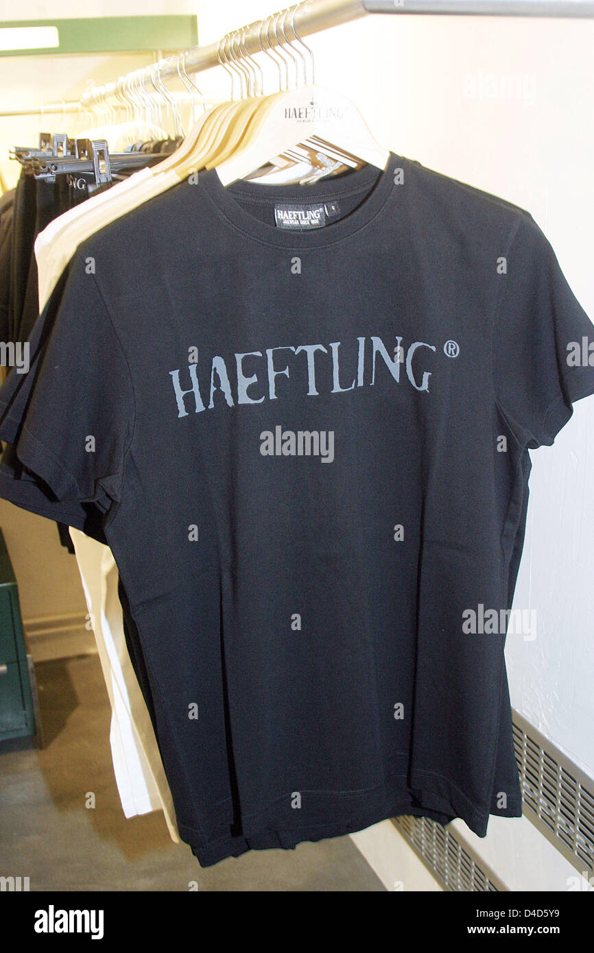 Tee shirts by 'Haeftling' ('Prisoner') are for sale at the new 'Haeftling Jailwear' store in Berlin, Germany, 21 February 2008. At the shop, Stefan Bohle, brand advertiser for 'Haeftling Jailwear', sells clothing made by prisoners of the Tegel correction facility. The prisoners' collection is rugged, robust and rather colourless. Photo: Xamax Stock Photo