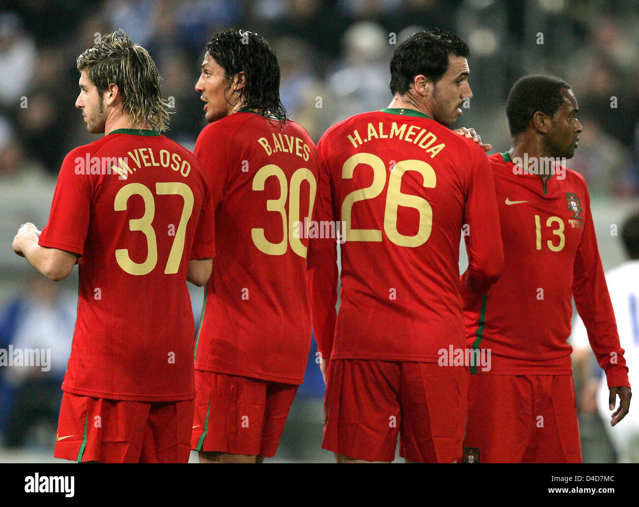 (L-R) Portugal's Miguel Veloso, Bruno Alves, Hugo Almeida and Miguel line up to form a wall in the test cap Portugal v Greece at LTU Arena stadium in Duesseldorf, Germany, 26 March 2008. Greece defeated Portugal 2-1. Photo: Federico Gambarini Stock Photo