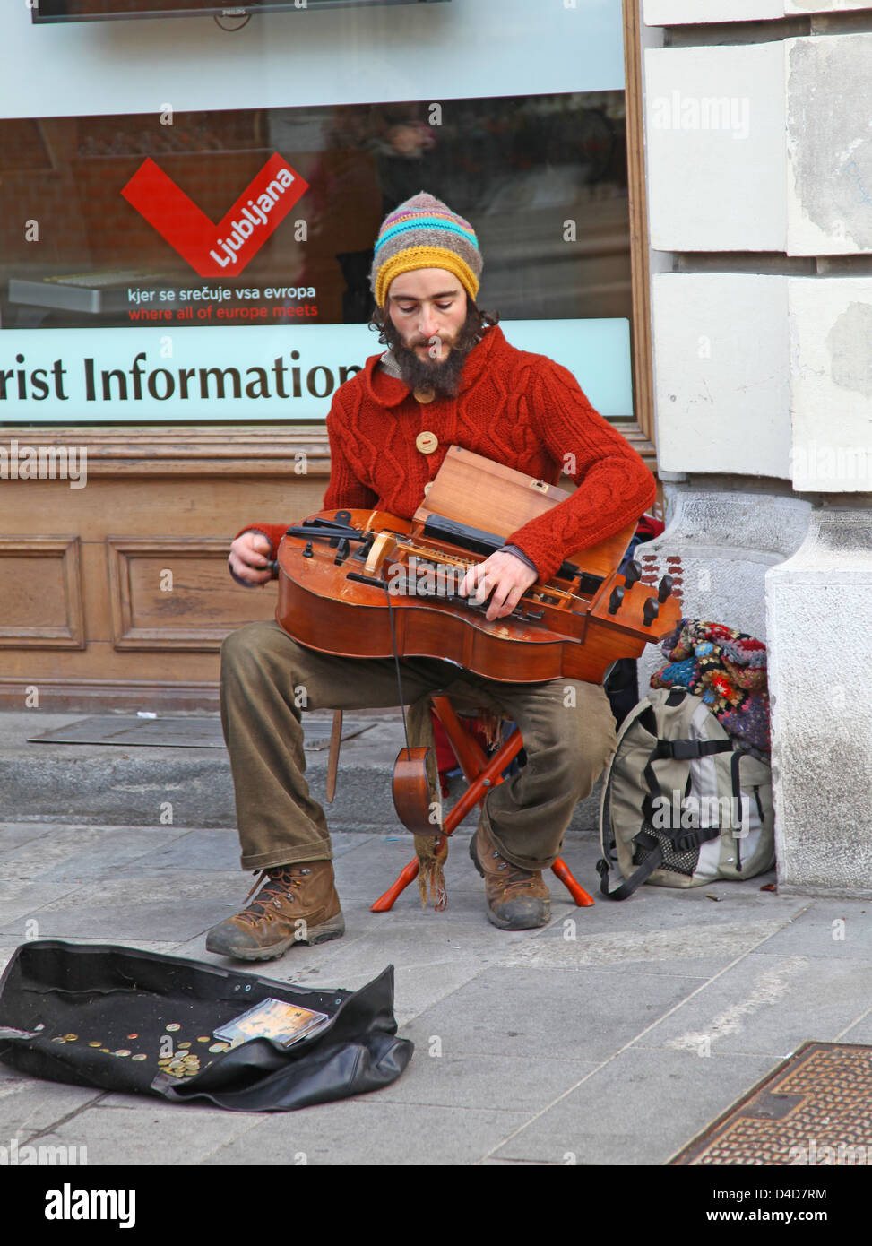 A street busker playing a musical instrument Ljubljana Slovenia Stock Photo