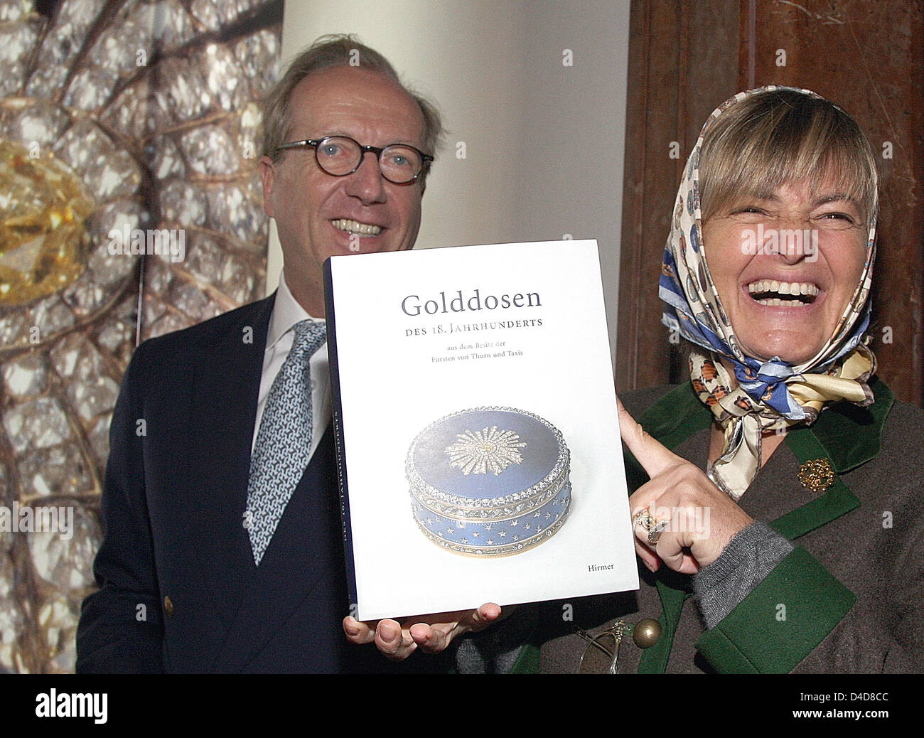 Princess Gloria von Thurn und Taxis and Graf Heinrich von Spreti, President of Sotheby's Germany, present the exhibition catalogue of a special exhibtion on golden tins from the 18th century at the 'Nationalmuseum' in Munich, Germany, 1 April 2008. The special exhibition 'Galante Preziosen des Fuersten von Thurn und Taxis' features former 'Thurn und Taxis' family jewellery. Photo:  Stock Photo