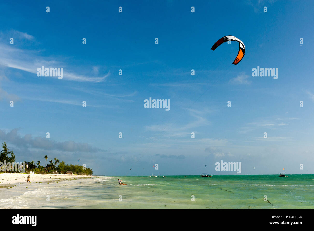 Kite surfer at beach, Paje, Zanzibar, Tanzania, Africa Stock Photo