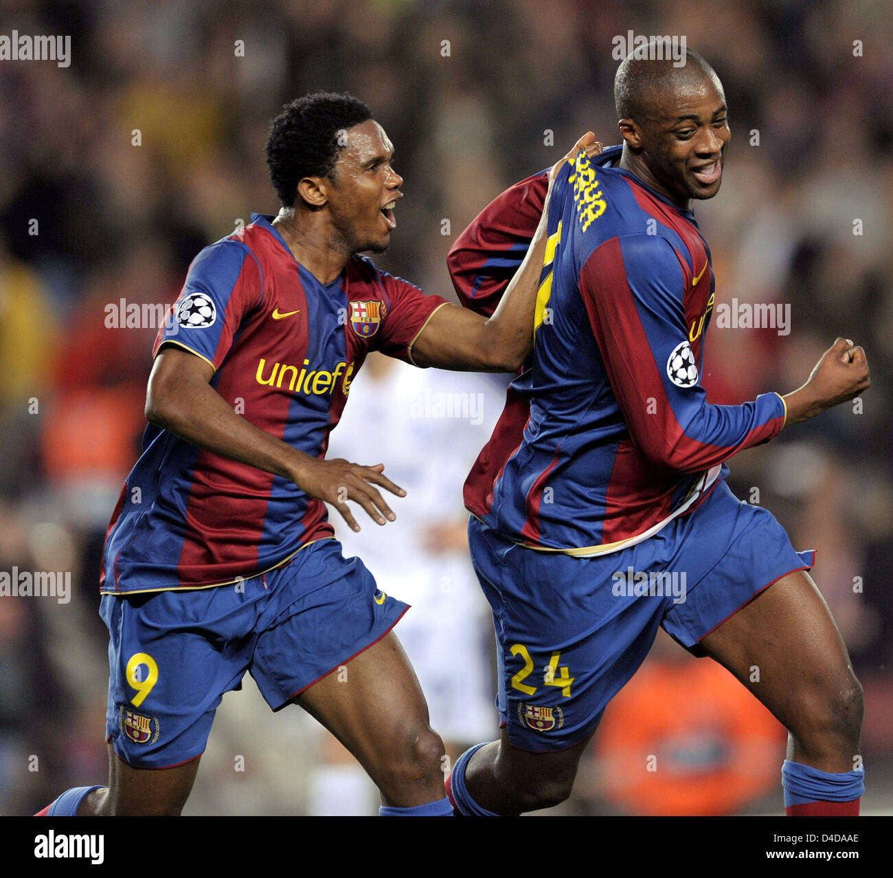 Barcelona's Yaya Toure (R) celebrates with his team-mate Samuel Eto'o (L) scoring the 1-0 poacher's in the UEFA Champions League quarter-finals match FC Barcelona v FC Schalke 04 at Camp Nuo stadium of Barcelona, Spain, 09 April 2008. A weak Spanish Primera Division side Barcelona won over German Bundesliga squad Schalke 1-0 and moves up to semi-finals with a 2-0 win on aggregate.  Stock Photo