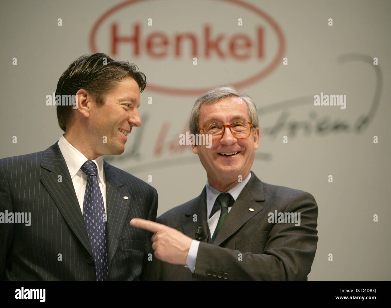 Henkel CEO Ulrich Lehner (R) points at his successor Kasper Rorstedt at
