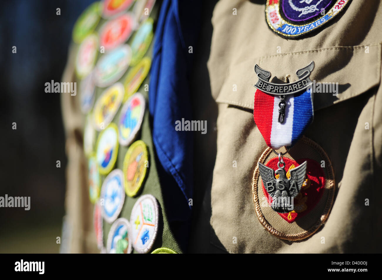 Boy Scouts of America close up of an Eagle Scout with a sash full of Merit badges Stock Photo