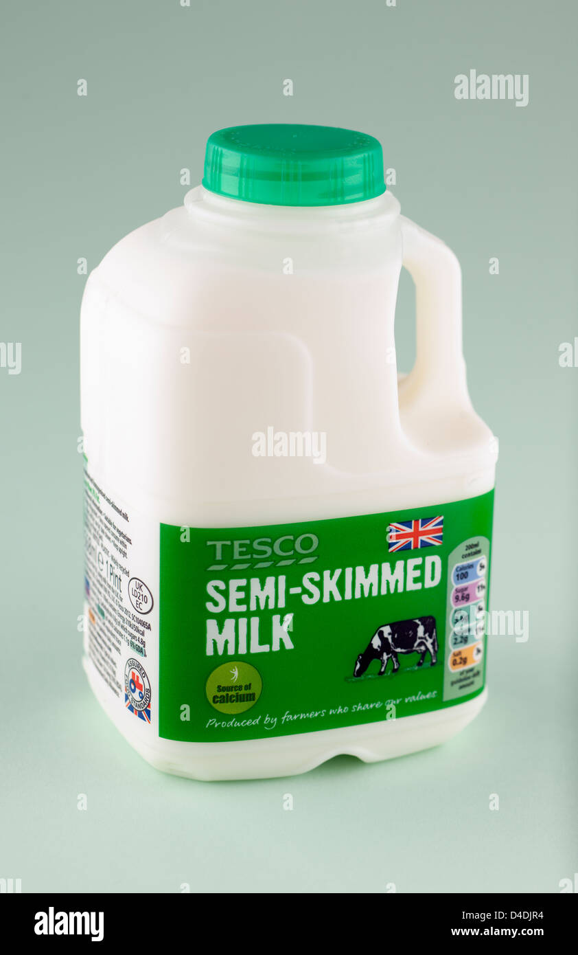 Tesco British one pint of semi skimmed milk Stock Photo