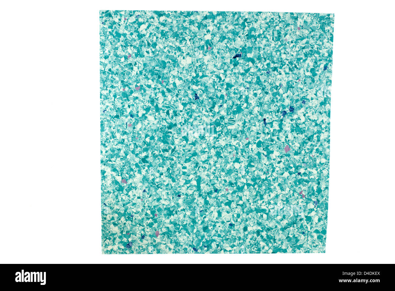 Uneven square piece of irregular turquoise vinyl flooring Stock Photo