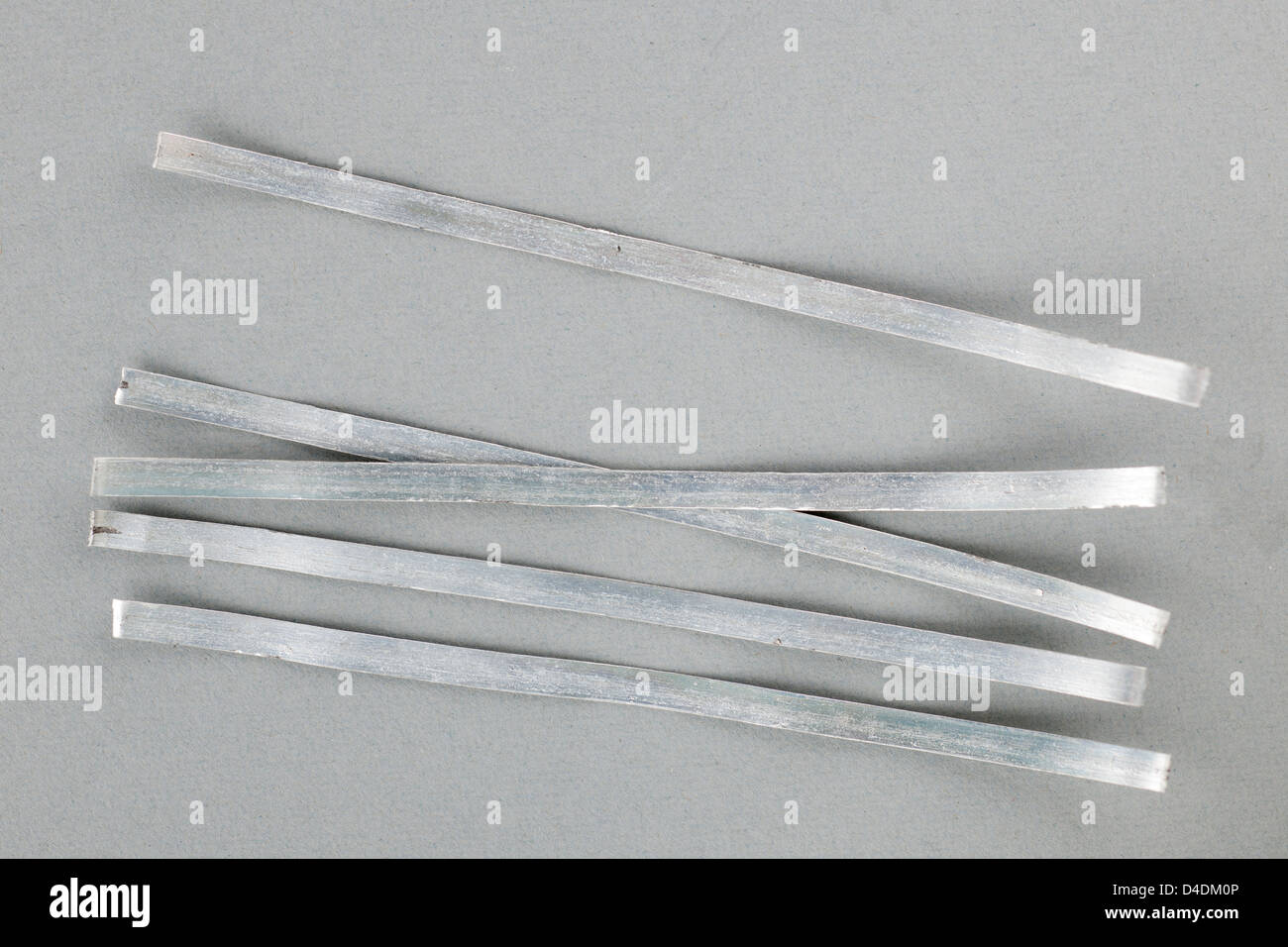 Five strips of Magnesium ribbon Stock Photo
