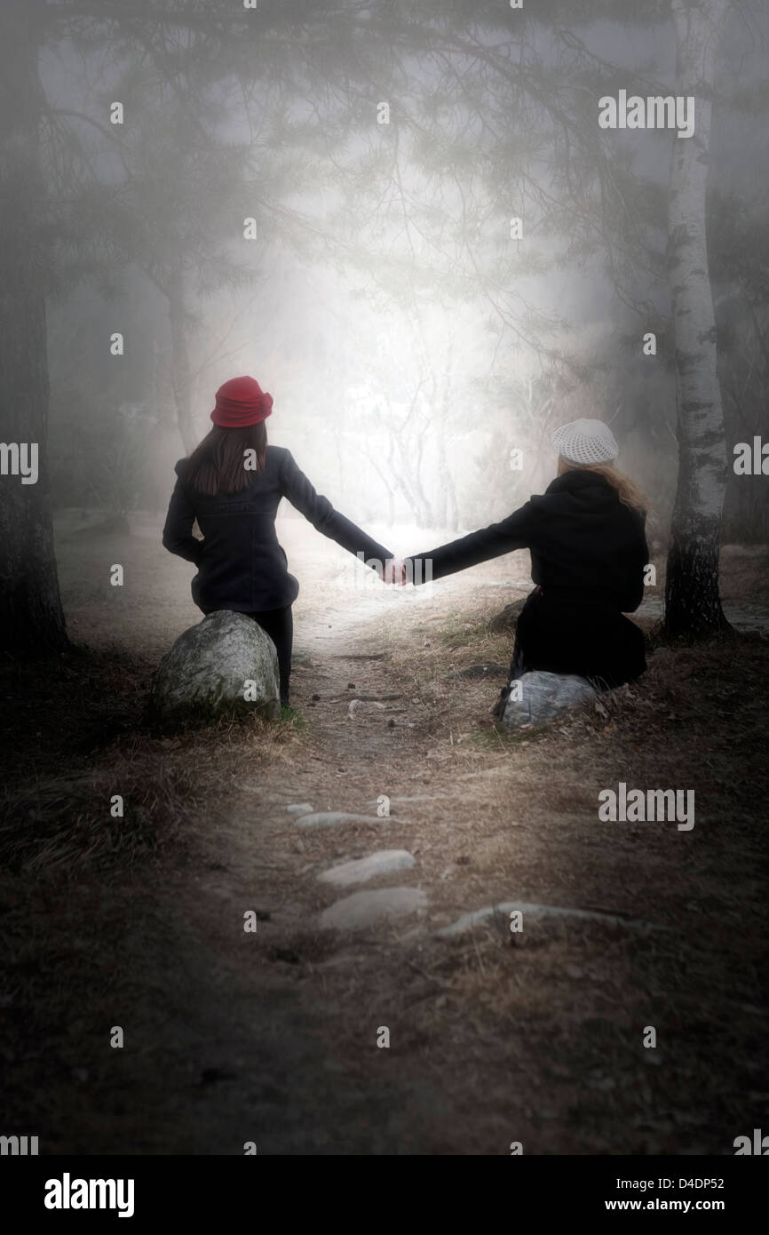 Two girls in the woods hi-res stock photography and images - Alamy