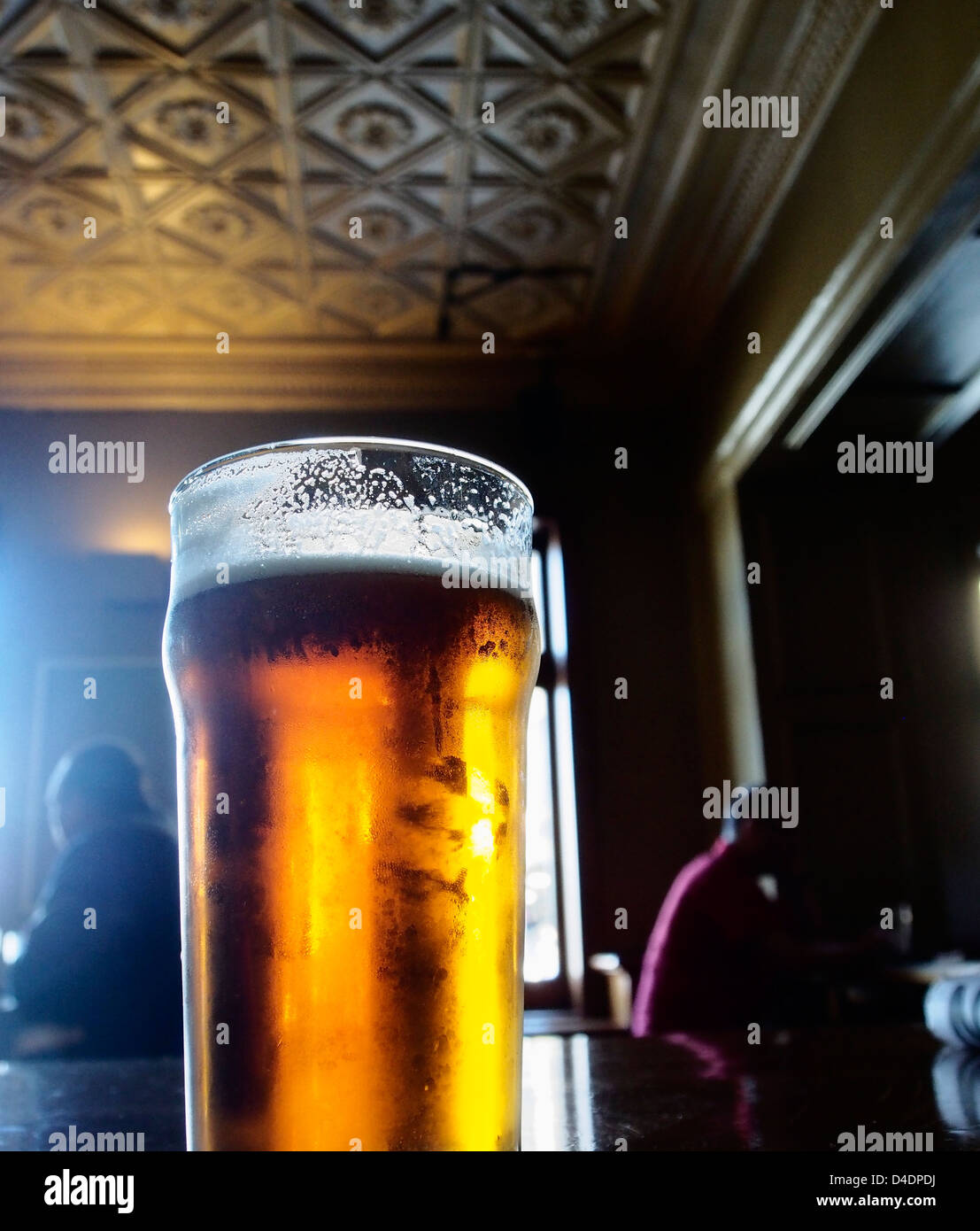 PINT OF BEER ON TABLE IN BAR OF YOUNG AND JACKSON PUBLIC HOUSE