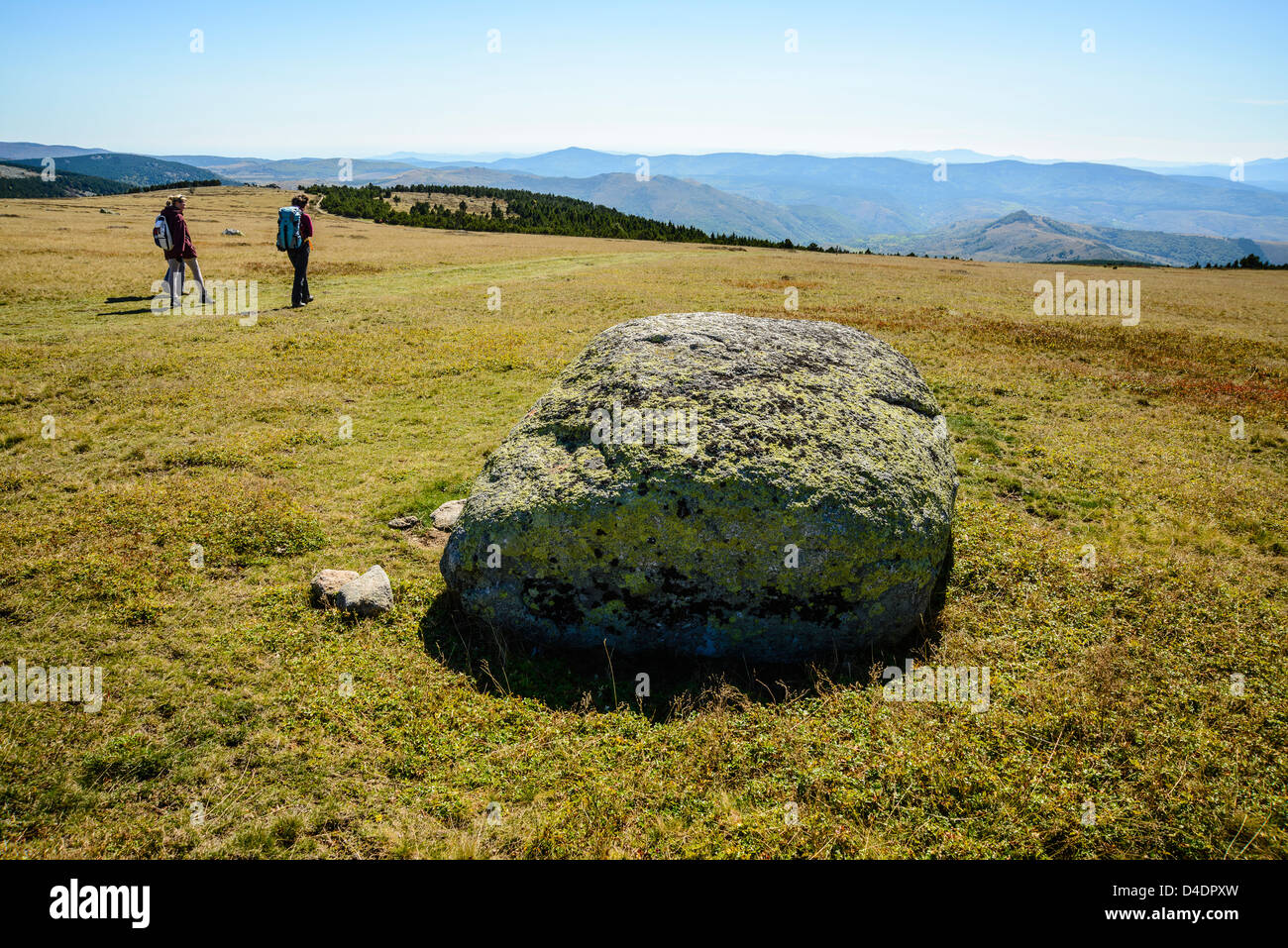 Walkers descending from the summit Pic de Finiels on Mont Lozère in the Cévennes, Lozère, France Stock Photo