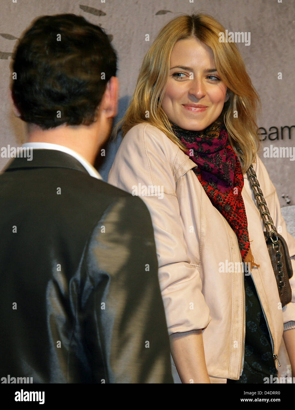 German top model Eva Padberg (R) and actor Erhan Emre (L) arrive for the premiere of German crime series 'Unschuldig' (Innocent) in Berlin, Germany, 16 April 2008. The series will be broadcasted weekly by German private TV station Pro7. Photo: Jens Kalaene Stock Photo