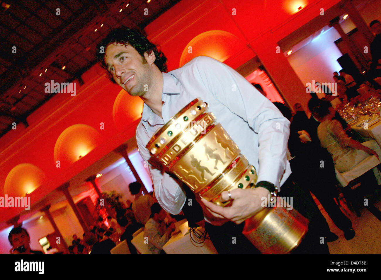 Luca Toni of Bayern Munic poses with the DFB-Trophy during the Bayern Munich champions party after the DFB Cup Final match between Borussia Dortmund and FC Bayern Munich at the Deutsche Telekom Represantive House Berlin, Germany, in the early morning hours of 20 April 2008. Photo: Andreas Rentz Stock Photo