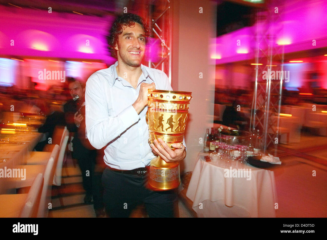 Luca Toni of Bayern Munic poses with the DFB-Trophy during the Bayern Munich champions party after the DFB Cup Final match between Borussia Dortmund and FC Bayern Munich at the Deutsche Telekom Represantive House Berlin, Germany, in the early morning hours of 20 April 2008. Photo: Alexander Hassenstein Stock Photo