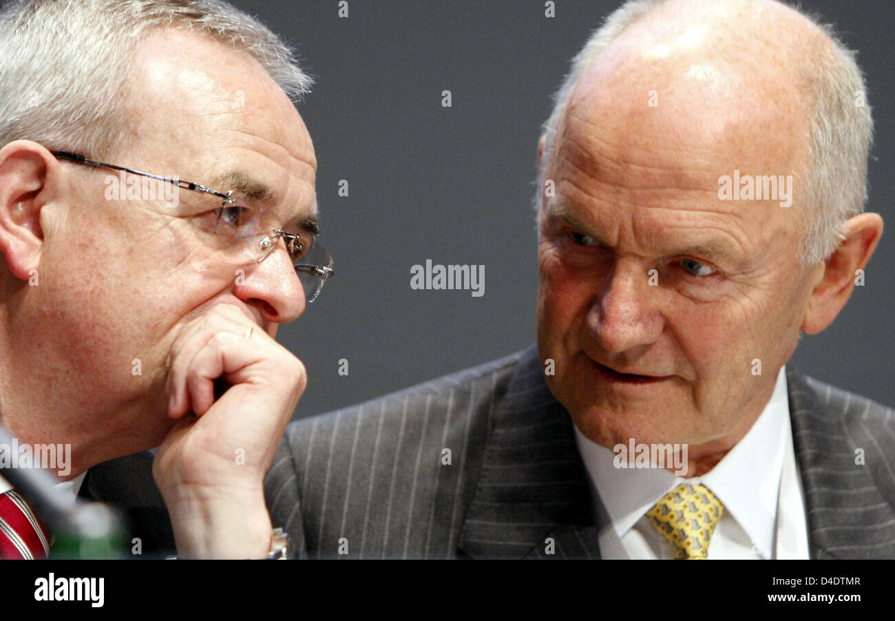 CEO of Volkswagen AG, Martin Winterkorn (L), and chairman of the supervisory board Ferdinand Piech are pictured at the outset of the automobile manufacturer's general meeting in Hamburg, Germany, 24 April 2008. The event is overshadowed by the power struggle of two of the major VW-shareholders, Porsche and Niedersachsen (Lower Saxony). The major issue is the 20 per cent blocking mi Stock Photo