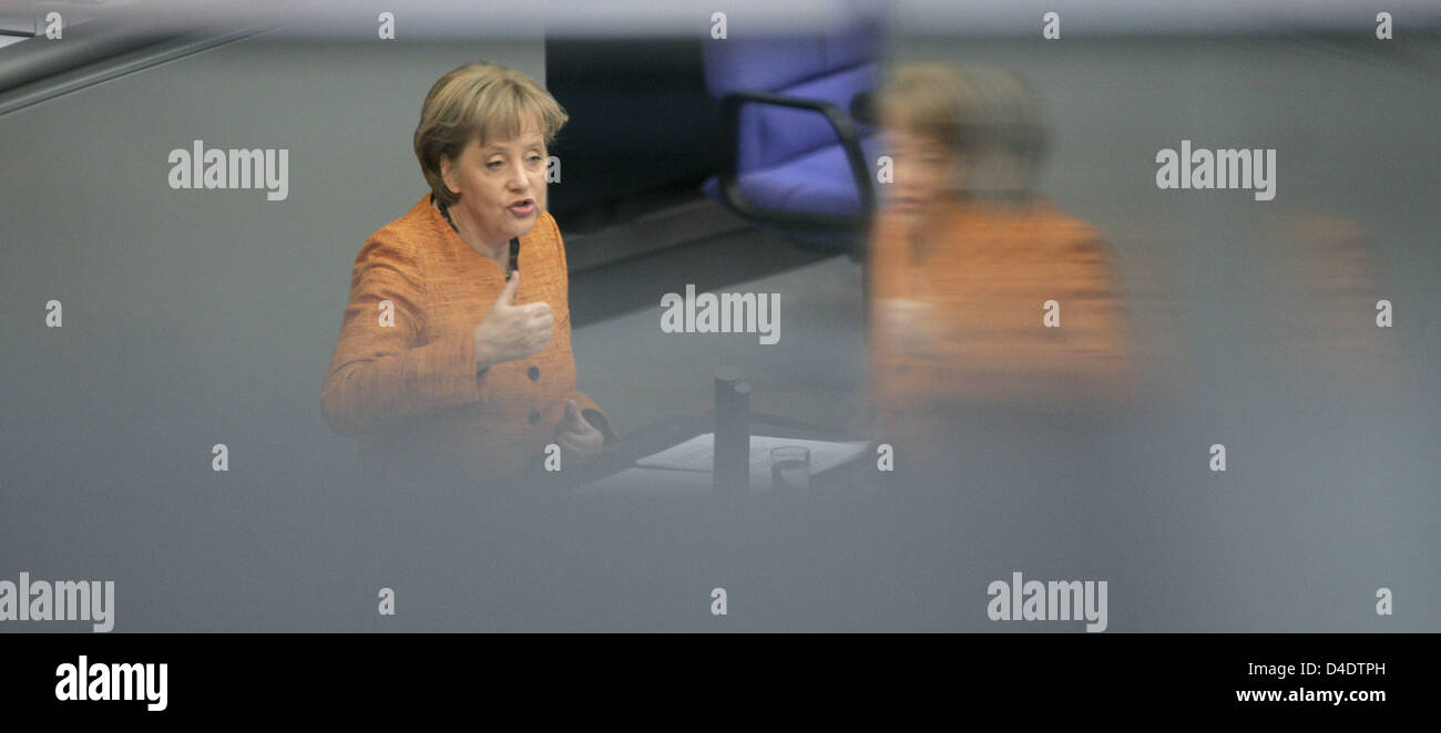 German Chancellor Angela Merkel delivers a speech at the Bundestag in Berlin, Germany, 24 April 2008. The parliamentarians later voted on the Treaty of Lisbon. Photo: PEER GRIMM Stock Photo