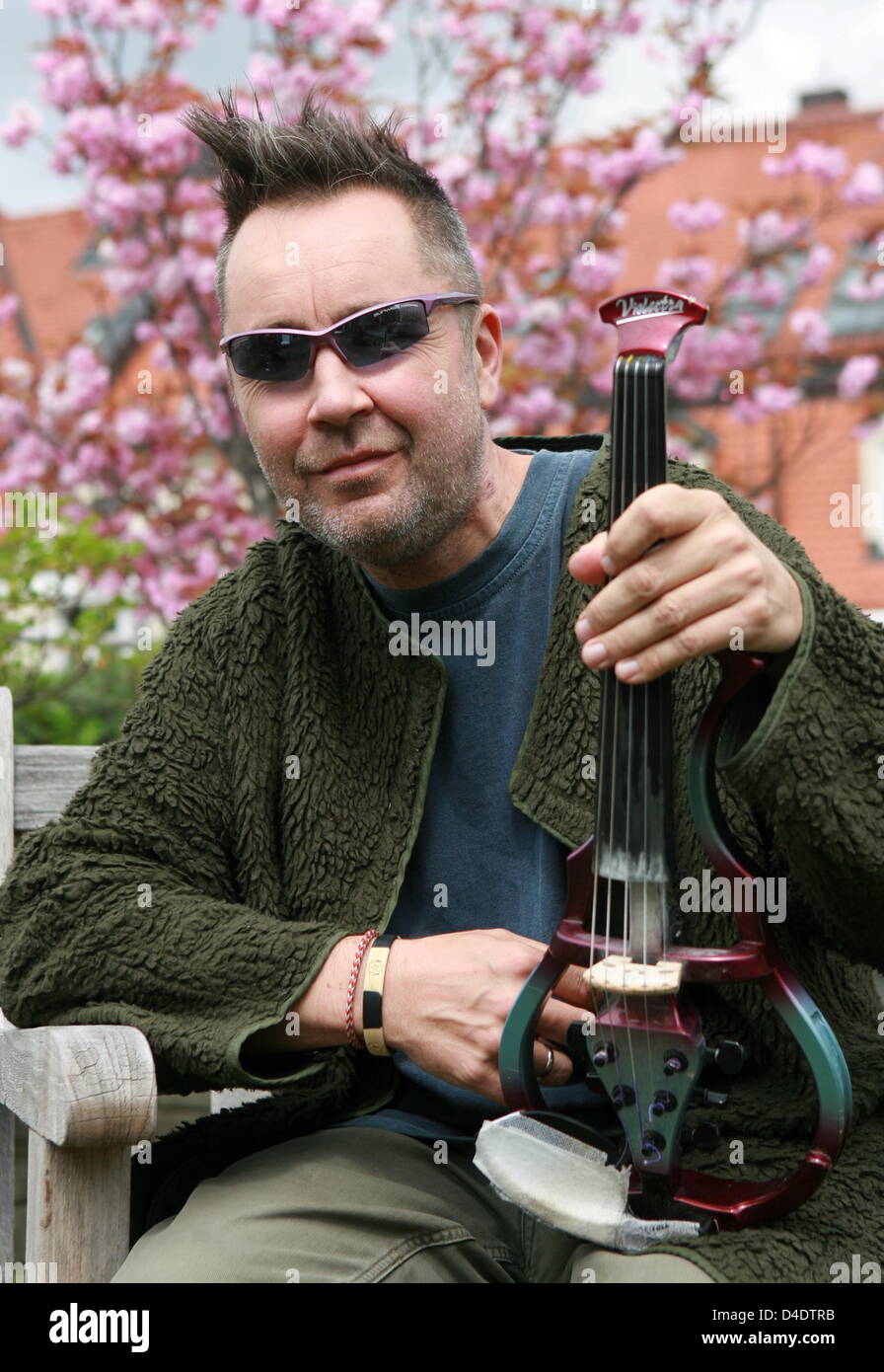 Violinist Nigel Kennedy poses during a photo call in Munich, Germany