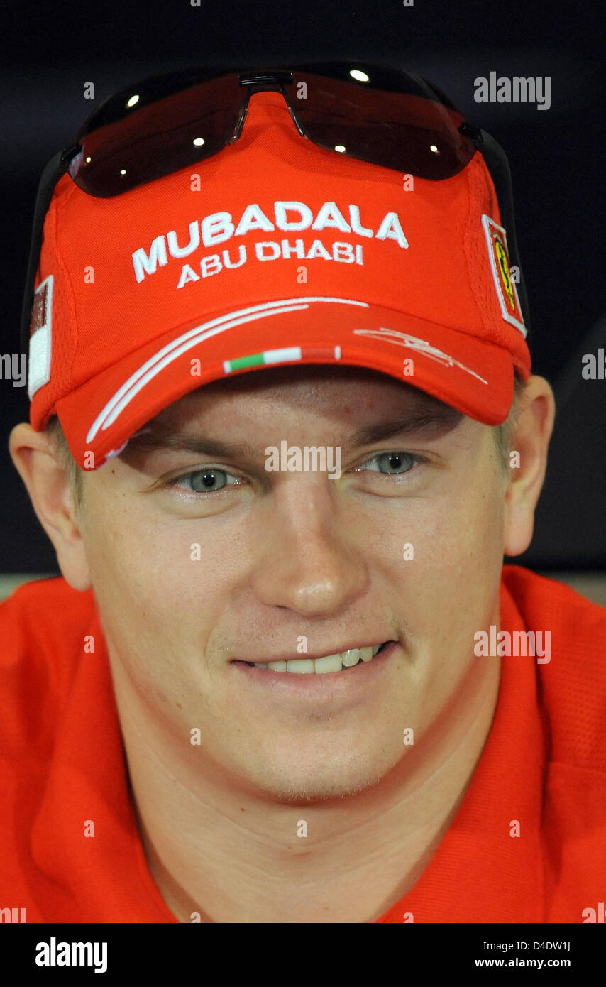 Finnish Formula One driver Kimi Raikkonen of Scuderia Ferrari smiles